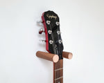 Load image into Gallery viewer, Walnut &amp; Copper Floating Guitar Holder Wall Mount / minimalist simple guitar rack
